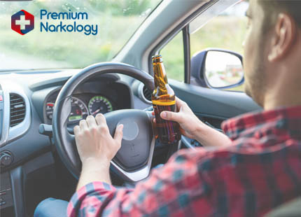 Последствия алкоголизма Мужчина с бутылкой пива за рулём